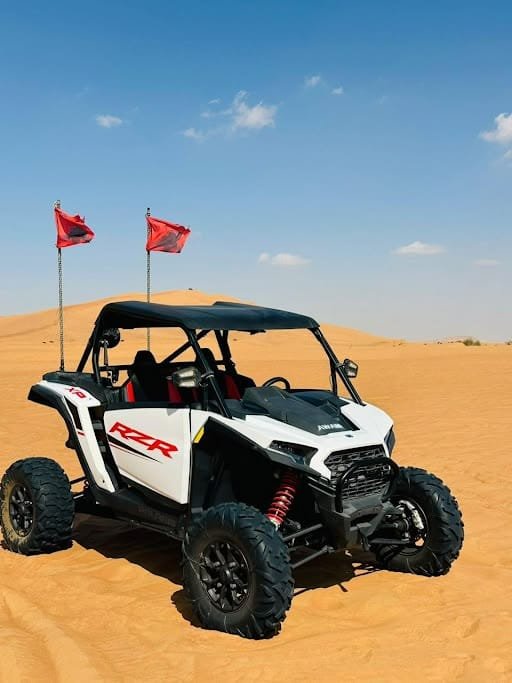 Can-Am Maverick X3 dune buggy on a guided dune bashing circuit in the Abu Dhabi desert