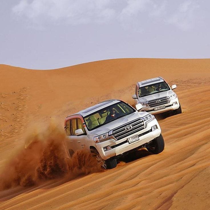 4x4 dune bashing on the high dunes of Al Khatim