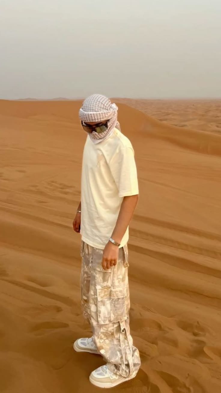 Wind-sculpted dunes near the quad track at Al Khatim