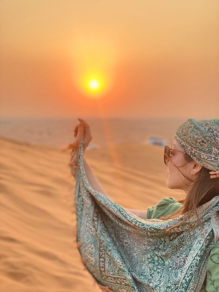 Arabic costume flowing dress desert dune photography Abu Dhabi