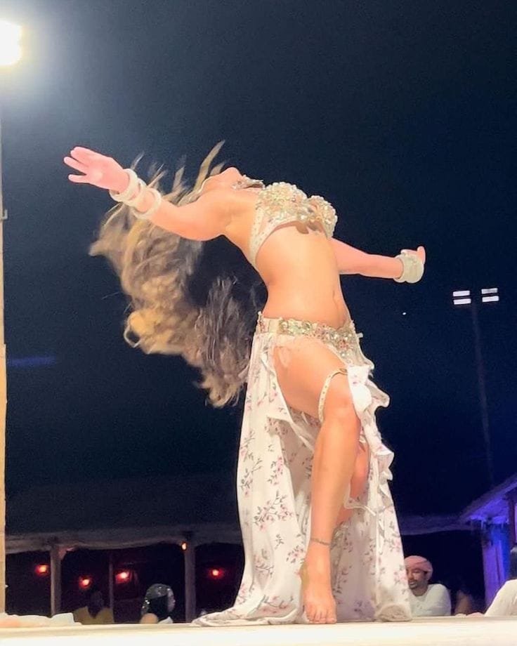 Belly dance performance at the evening desert safari camp in Abu Dhabi