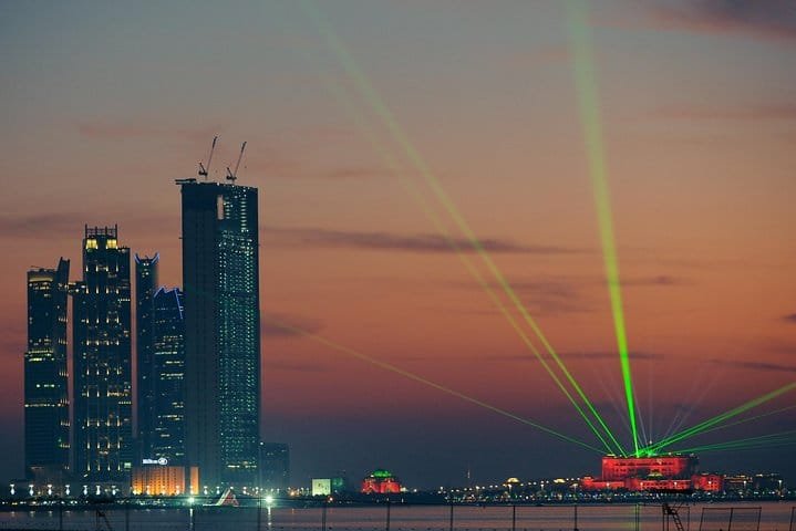 Etihad Towers at Dusk Etihad Towers Abu Dhabi lit at dusk during the city laser display