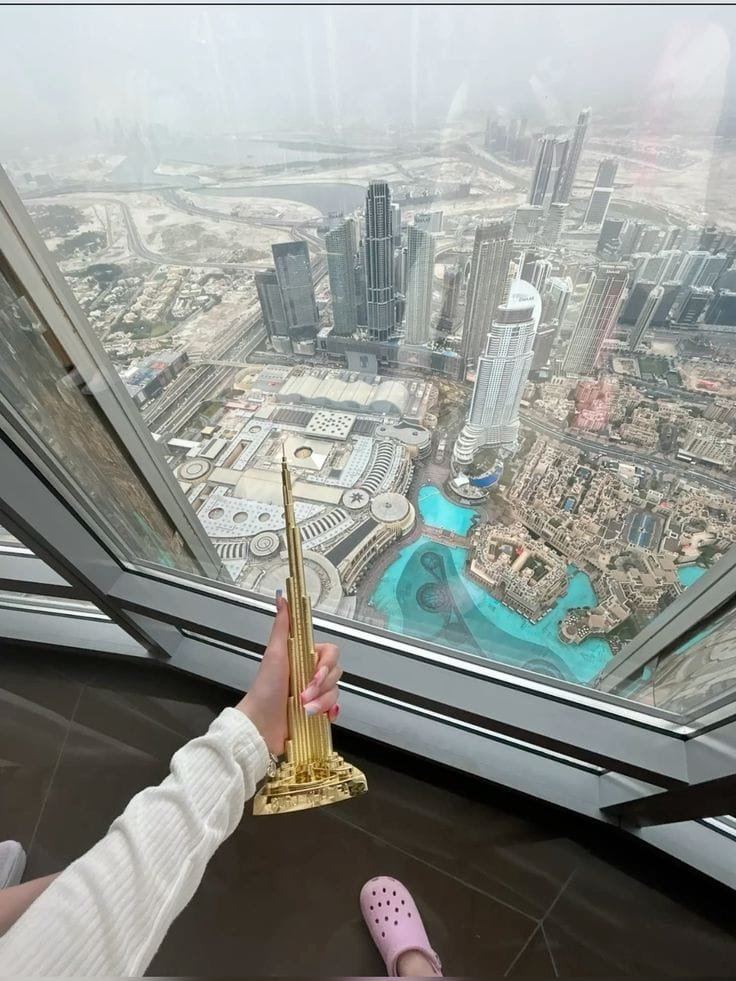View from Burj Khalifa over Downtown Dubai and fountain area