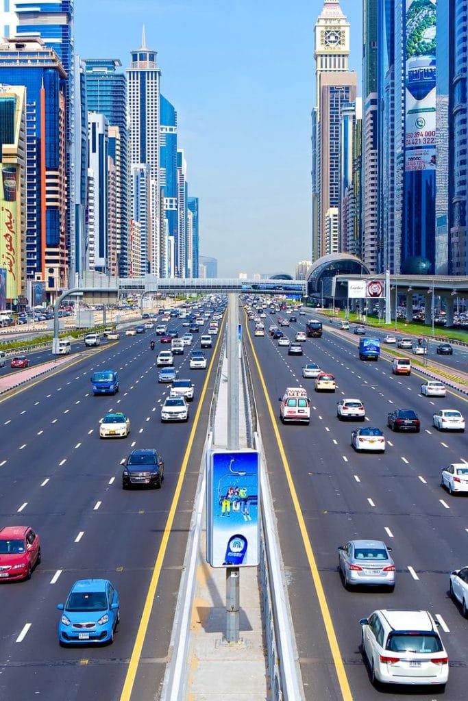 Busy Sheikh Zayed Road highway lined with skyscrapers in Dubai