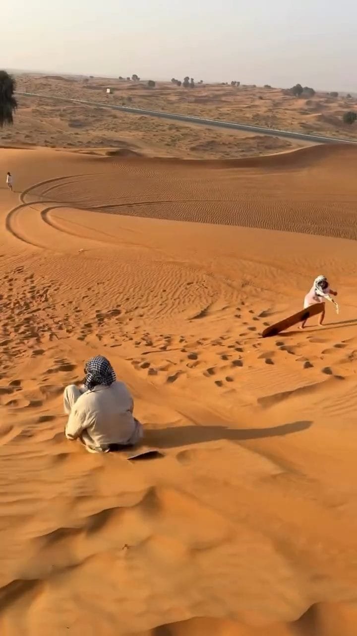 Guest filming their Abu Dhabi desert safari experience