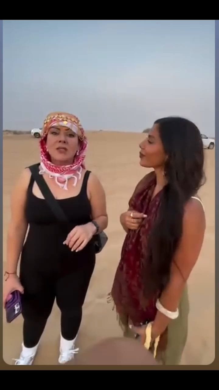 Guest filming their Abu Dhabi desert safari experience