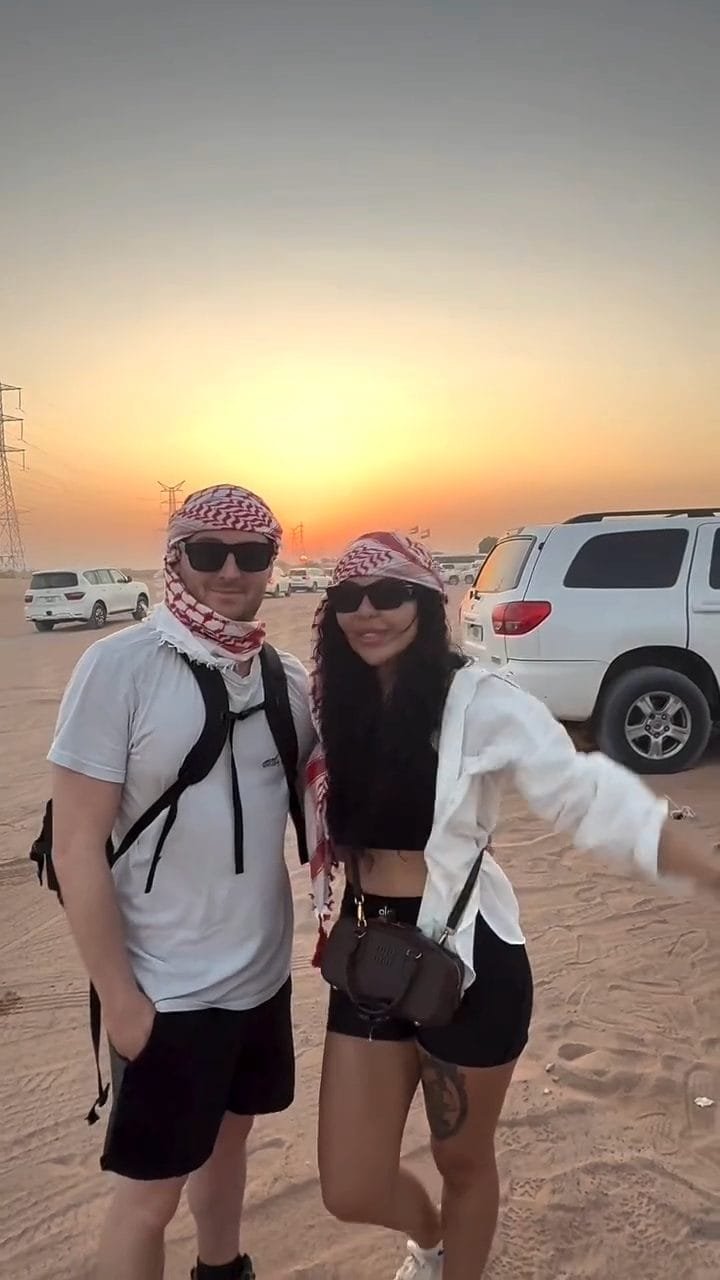 Guest filming their Abu Dhabi desert safari experience