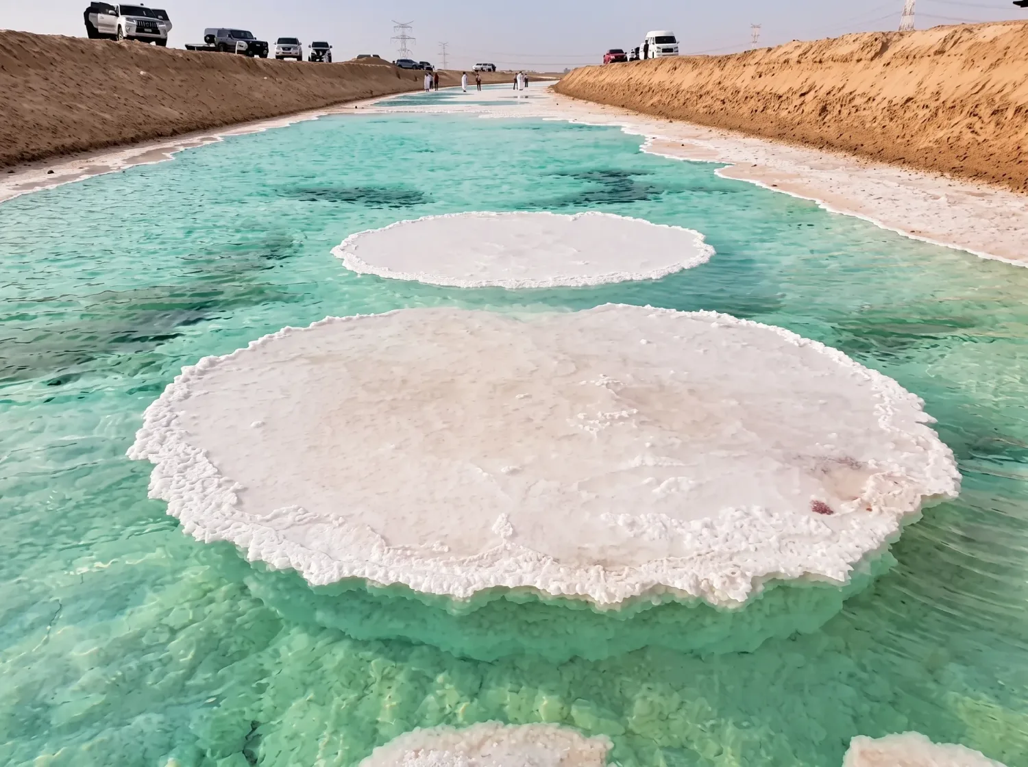 Al Wathba Salt Lake near Abu Dhabi with turquoise pools and salt crusts at golden hour