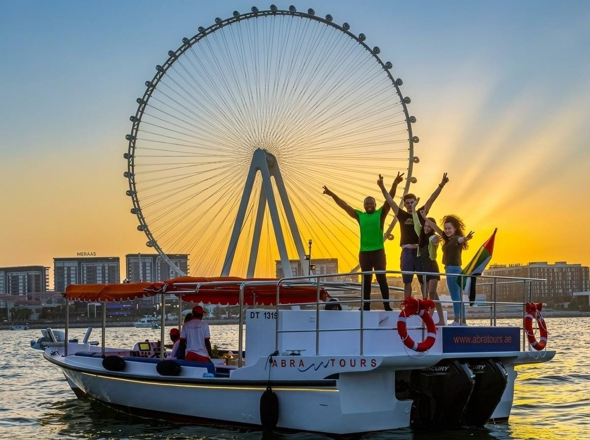 Guests at the Ain Dubai wheel on the JBR waterfront during a Dubai layover tour